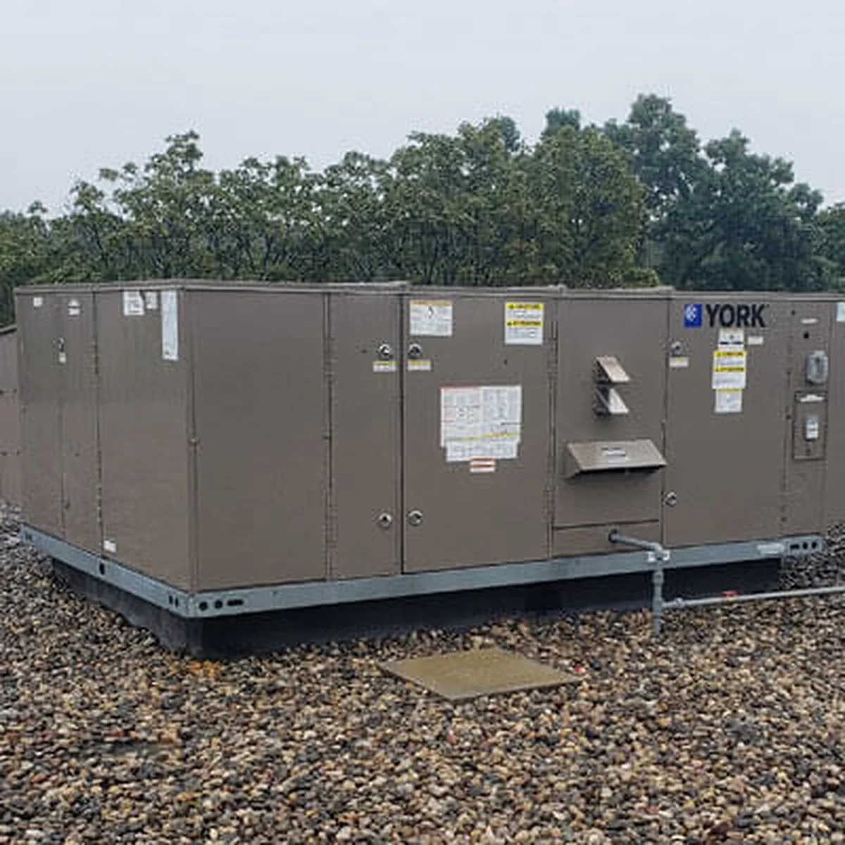 Commercial rooftop HVAC unit on a retail building