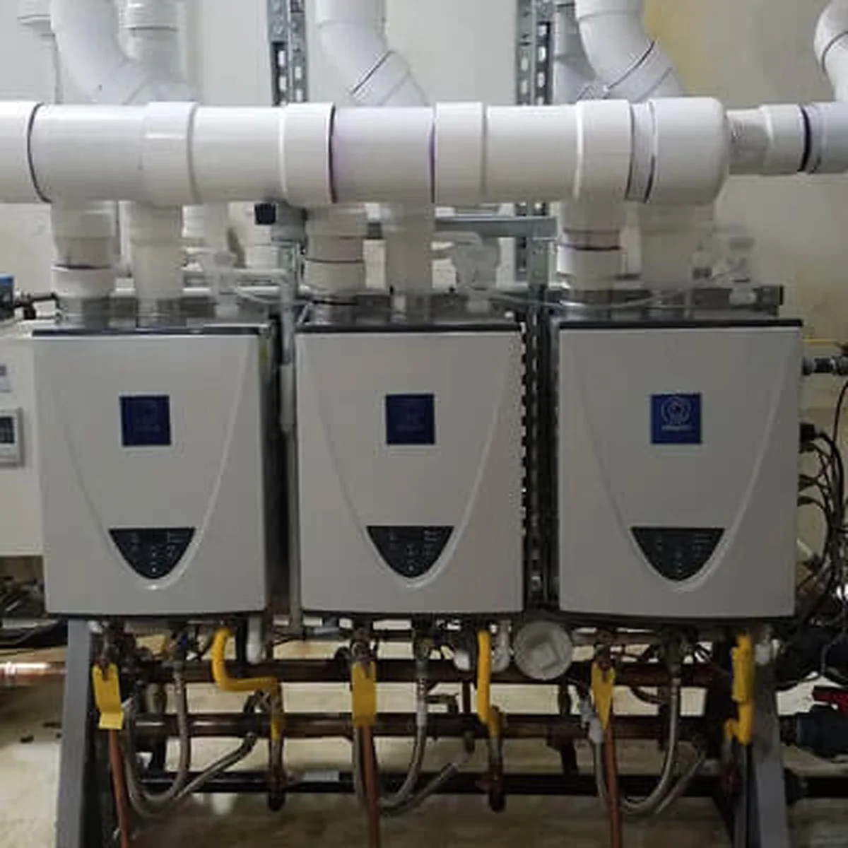 Large industrial mechanical ventilation and ductwork system inside a plant